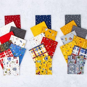 May include: A set of 12 fabric squares featuring a variety of city-themed patterns. The squares are arranged in three stacks of four, with each stack featuring a different color scheme: red, yellow, and gray. The patterns include cars, buildings, streets, and other city elements.