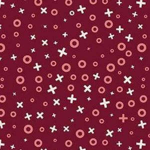 May include: A burgundy background with a repeating pattern of white crosses and pink circles. The pattern is scattered across the surface, creating a playful and abstract design.