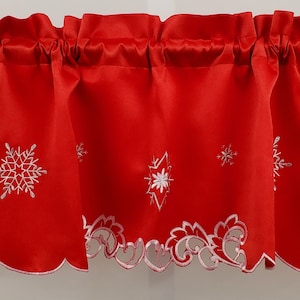 May include: Red valance with white scalloped edges and snowflake embroidery.