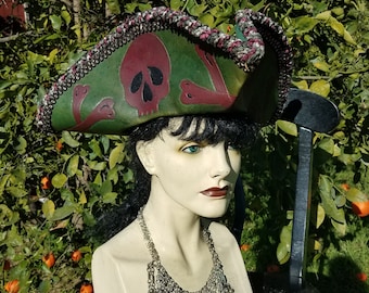 Green leather tri corner pirate hat, tooled skull and crossbones