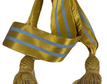 Gold with  blue stripes  general waist  Sash with Gold tassels Details it’s full adult size Sash