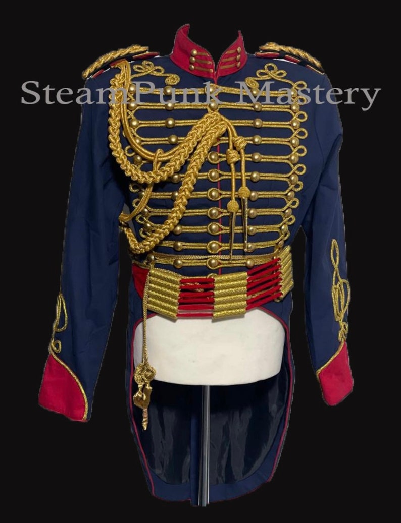 May include: A blue and red military-style jacket with gold trim and buttons. The jacket has a high collar and a long tail. The jacket is decorated with gold braid and a gold belt with red accents.