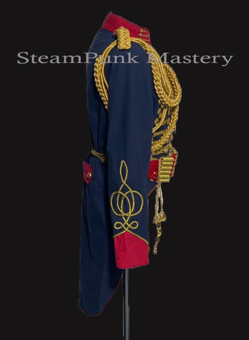 May include: A blue and red military-style jacket with gold trim and a gold braid accent. The jacket has a long tail and a stand-up collar.
