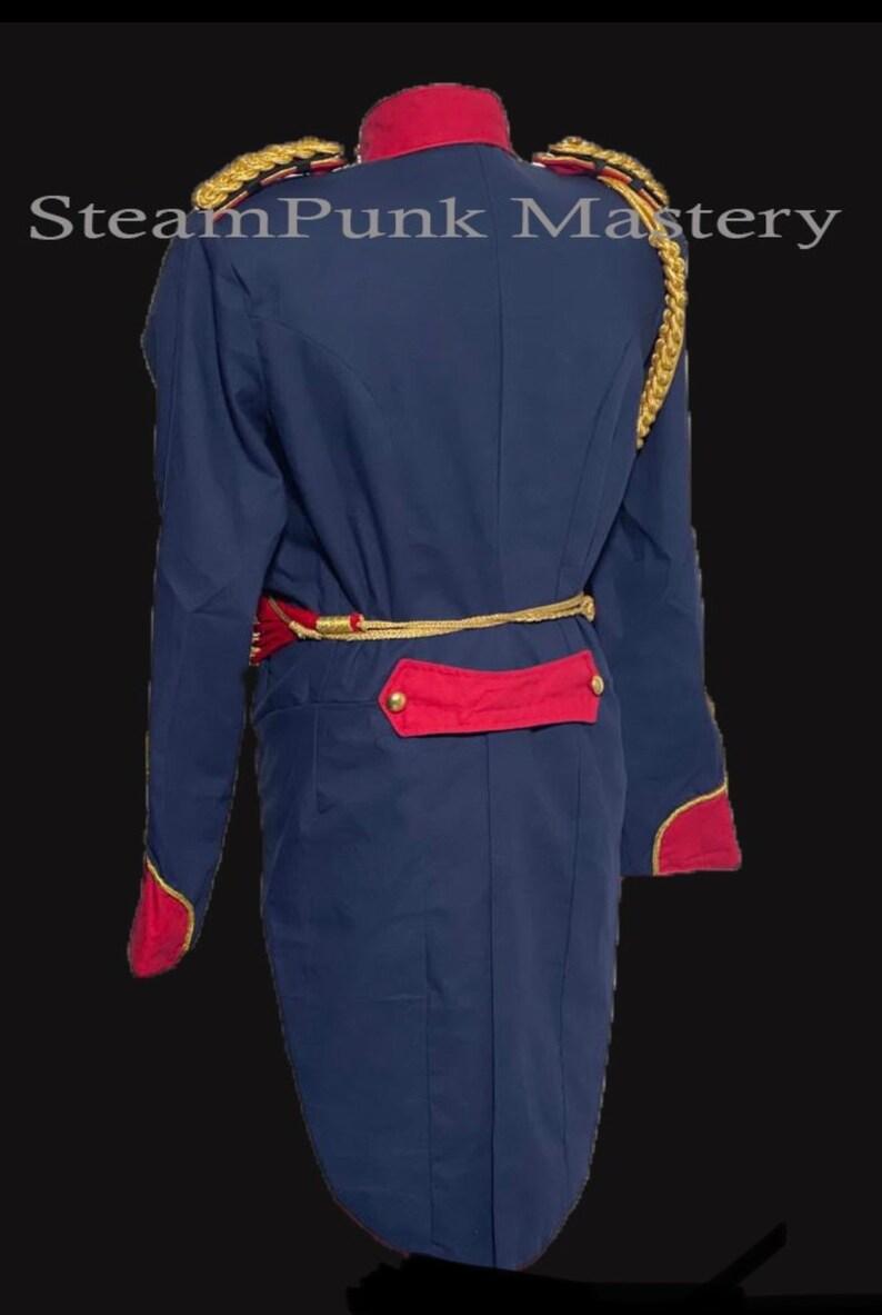 May include: A navy blue tailcoat with gold braid trim and red accents. The coat has a high collar and a long, flowing tail. The coat is fastened with a gold belt.