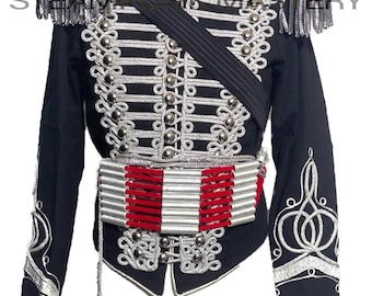 May include: A navy blue military-style jacket with silver and white embellishments. The jacket features silver buttons, epaulets, and intricate embroidery. A red and silver belt and a black sash complete the look. The jacket has a high collar.