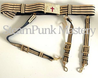 Black & gold adjustable sword belt with gold plated buckle with Red Cross with slings to fit waist size 28”to 48”