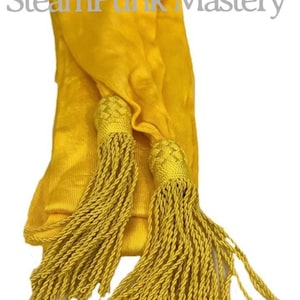 Yellow gold general waist  Sash with Self tassels Details it’s full adult size Sash