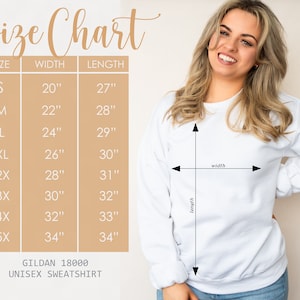 May include: A woman wearing a white Gildan 18000 unisex sweatshirt. The image includes a size chart with measurements in inches for sizes S through 5X. The chart shows width and length measurements for each size. The text "Size Chart" is at the top.