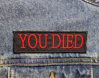 You Died Embroidered Iron On Patch.