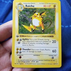 1st edition raichu pokemon card PSA 7 NM do the damage to each of them. Pokemon - Raichu (14/102) -