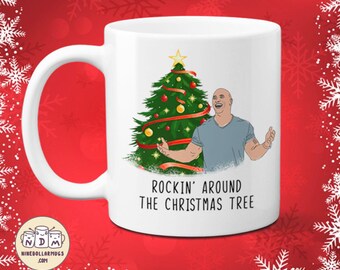 ドウェイン・ジョンソンの面白いクリスマスマグカップ：ツリーの周りで踊るギフト