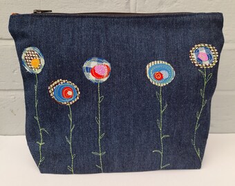 Make up/Toiletry bag. Waterproof lined. Fabric applique and free machine embroidery zip purse.