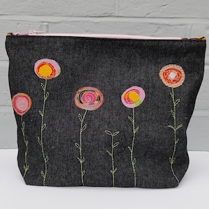 Make up/Toiletry bag. Waterproof lined. Fabric applique and free machine embroidery zip purse.