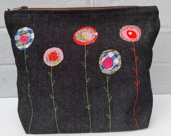 Make up/Toiletry bag. Waterproof lined. Fabric applique and free machine embroidery zip purse.