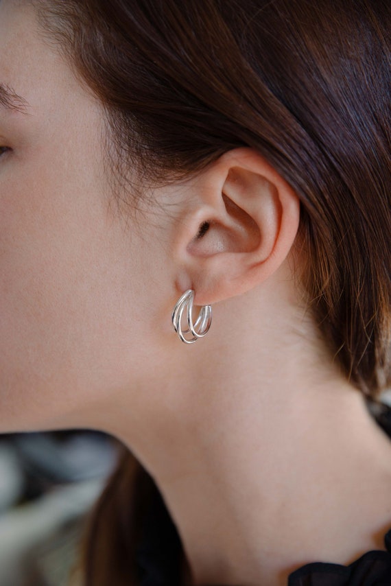 Designer silver hoop earrings best sale