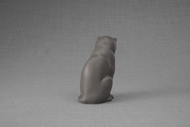 Ceramic Art Urn for Cats cremation ashes. The urn represents a cat sitting in a comfortable position with its tail around her body and its head gently looking left. Mini pet memorial urn. Pet memorial urn for ashes. Pet mini urn. Mini Urn by Pulvis