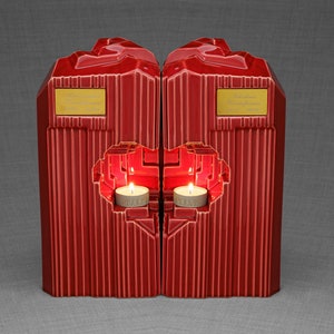 Companion urn set of two high-quality ceramic cremation urns for ashes. This companion urn (double urn) consists of two identical Heart urns, which placed together form a large heart.  Designed and made by Pulvis Art Urns. Available in many colors.