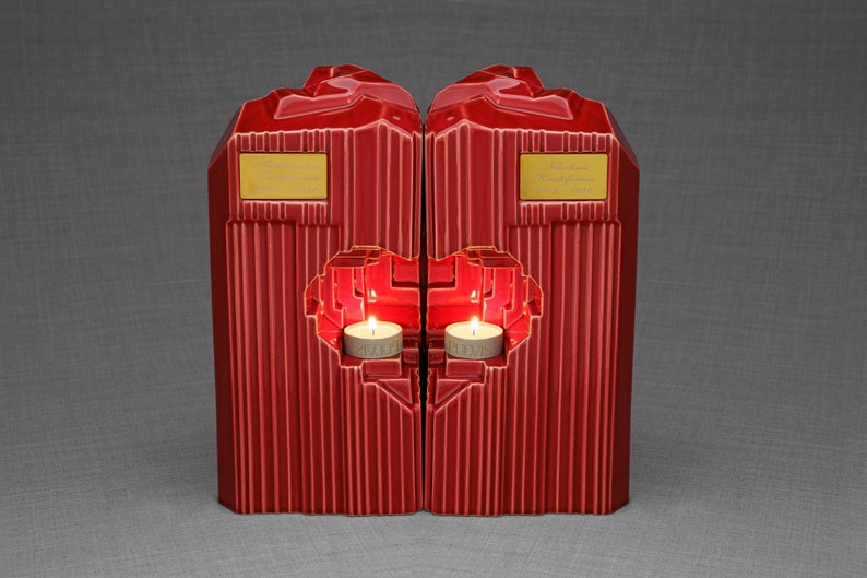 Companion urn set of two high-quality ceramic cremation urns for ashes. This companion urn (double urn) consists of two identical Heart urns, which placed together form a large heart.  Designed and made by Pulvis Art Urns. Available in many colors.