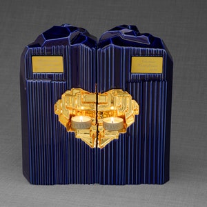 Companion urn set of two high-quality ceramic cremation urns for ashes. This companion urn (double urn) consists of two identical Heart urns, which placed together form a large heart.  Designed and made by Pulvis Art Urns. Available in many colors.