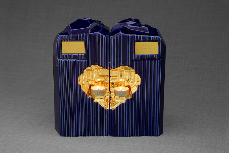 Companion urn set of two high-quality ceramic cremation urns for ashes. This companion urn (double urn) consists of two identical Heart urns, which placed together form a large heart.  Designed and made by Pulvis Art Urns. Available in many colors.