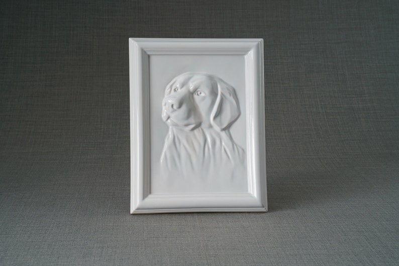 Labrador Retriever Pet Urn for Ashes. This beautiful picture frame portrait urn of a labrador retriever is a unique memorial for a lab dog. Handmade from ceramic, this pet urn for labrador is the ideal resting place for a loved friend. By Pulvis Art