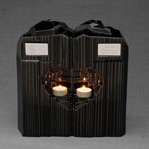 Companion urn set of two high-quality ceramic cremation urns for ashes. This companion urn (double urn) consists of two identical Heart urns, which placed together form a large heart.  Designed and made by Pulvis Art Urns. Available in many colors.