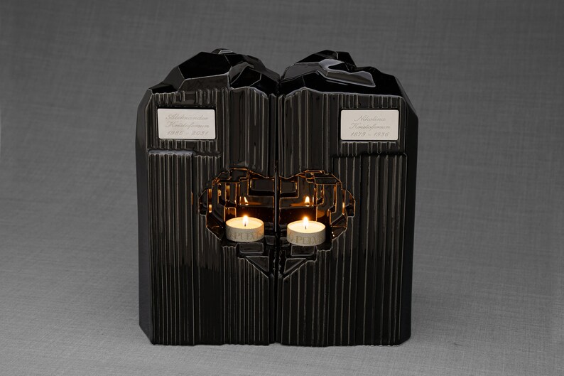 Companion urn set of two high-quality ceramic cremation urns for ashes. This companion urn (double urn) consists of two identical Heart urns, which placed together form a large heart.  Designed and made by Pulvis Art Urns. Available in many colors.