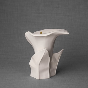 High-quality ceramic cremation urn for human ashes, suitable for home, garden or columbarium. This is a medium size urn. Calla Lily Flower Urn for Ashes. Calla Flower Cremation Urn by Pulvis Art Urns Handcrafted memorial flower urn by Pulvis Art Urns