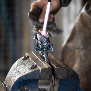 High-quality Handwrought Iron Rose, a suitable addition to our large urns and keepsakes. This item does not hold cremation ashes.