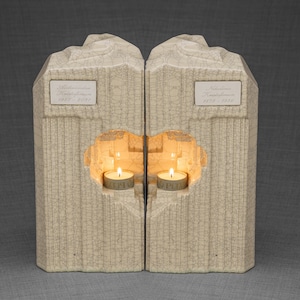 Companion urn set of two high-quality ceramic cremation urns for ashes. This companion urn (double urn) consists of two identical Heart urns, which placed together form a large heart.  Designed and made by Pulvis Art Urns. Available in many colors.