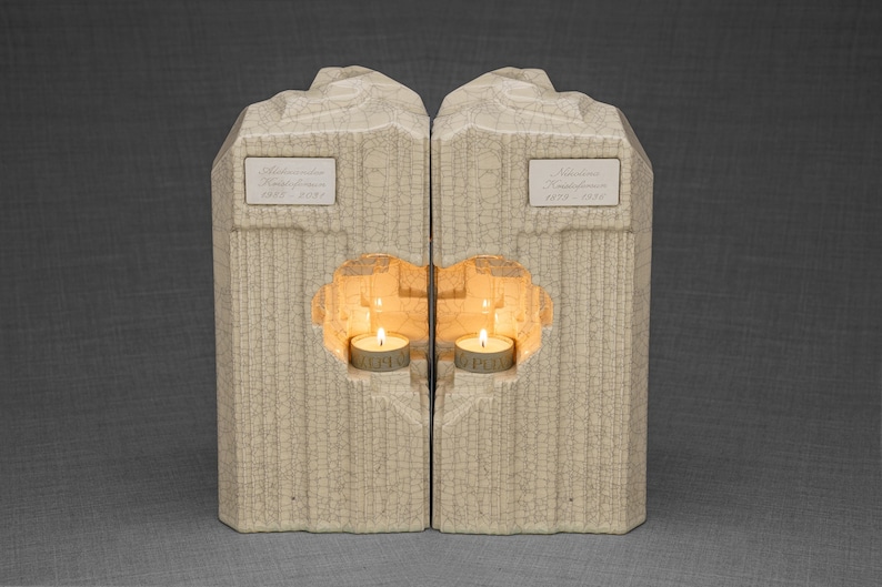 Companion urn set of two high-quality ceramic cremation urns for ashes. This companion urn (double urn) consists of two identical Heart urns, which placed together form a large heart.  Designed and made by Pulvis Art Urns. Available in many colors.