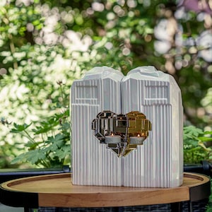 Companion urn set of two high-quality ceramic cremation urns for ashes. This companion urn (double urn) consists of two identical Heart urns, which placed together form a large heart.  Designed and made by Pulvis Art Urns. Available in many colors.