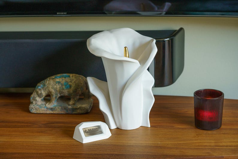 Pulvis Art Urns creates exceptional handmade cremation urns for humans and pets, carefully crafted in Europe by skilled artisans. Each urn combines modern design with timeless craftsmanship, offering a unique and meaningful way to honor a loved one. Made from premium ceramic materials, Pulvis urns are suitable for display at home or for outdoor memorials, blending beauty, durability, and symbolism. Every piece is thoughtfully designed to celebrate life, love, and remembrance.