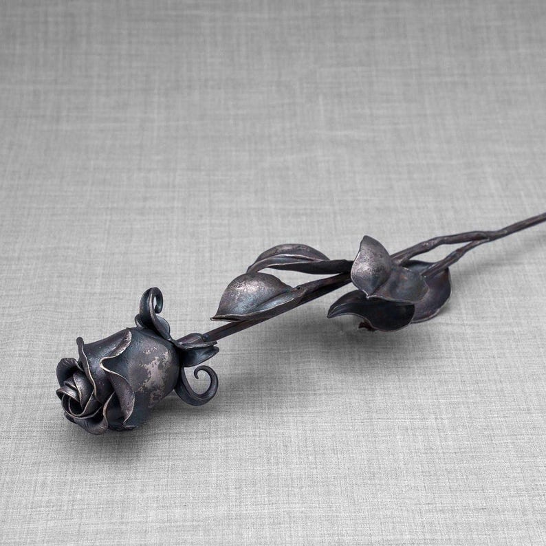High-quality Handwrought Iron Rose, a suitable addition to our large urns and keepsakes. This item does not hold cremation ashes.
