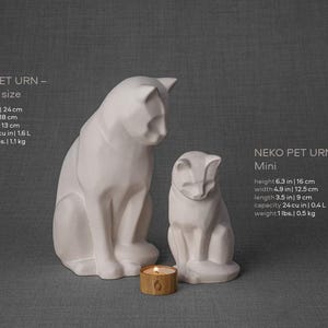 Ceramic Art Urn for Cats cremation ashes. The urn represents a cat sitting in a comfortable position with its tail around her body and its head gently looking left. Mini pet memorial urn. Pet memorial urn for ashes. Pet mini urn. Mini Urn by Pulvis