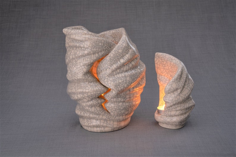 Handmade Adult Urn for Cremation ashes. The urn has a place for a candle in the middle, or option for putting flowers. Adult size urn with capacity of 237 cubic inches. Ashes go inside the walls. The color of this handmade ceramic urn is craquelure.