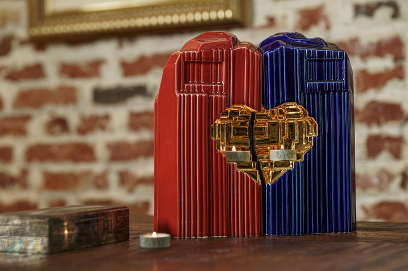 Companion urn set of two high-quality ceramic cremation urns for ashes. This companion urn (double urn) consists of two identical Heart urns, which placed together form a large heart.  Designed and made by Pulvis Art Urns. Available in many colors.