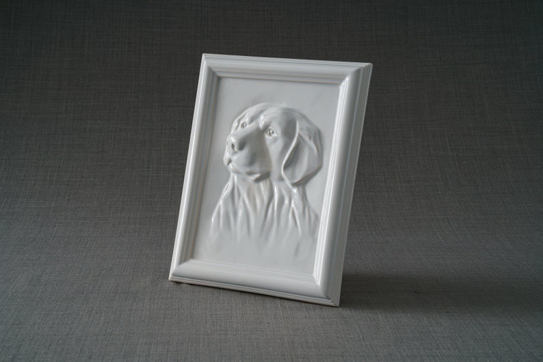 Labrador Retriever Pet Urn for Ashes. This beautiful picture frame portrait urn of a labrador retriever is a unique memorial for a lab dog. Handmade from ceramic, this pet urn for labrador is the ideal resting place for a loved friend. By Pulvis Art