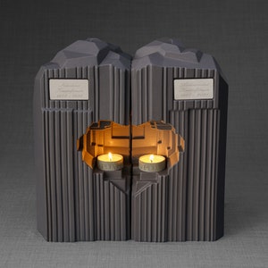 Companion urn set of two high-quality ceramic cremation urns for ashes. This companion urn (double urn) consists of two identical Heart urns, which placed together form a large heart.  Designed and made by Pulvis Art Urns. Available in many colors.