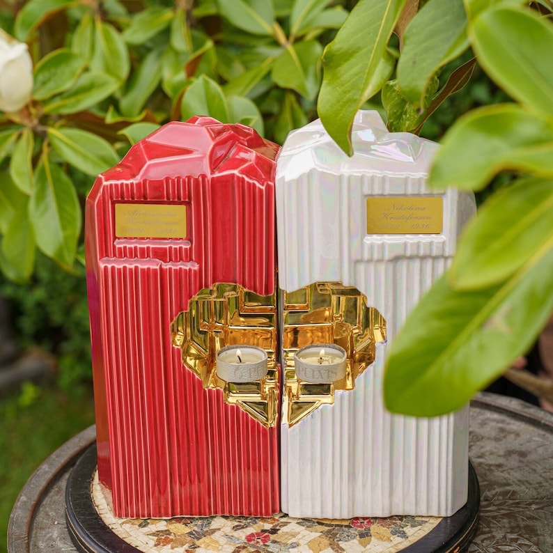 Companion urn set of two high-quality ceramic cremation urns for ashes. This companion urn (double urn) consists of two identical Heart urns, which placed together form a large heart.  Designed and made by Pulvis Art Urns. Available in many colors.