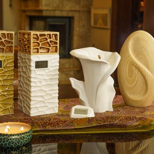 Pulvis Art Urns creates exceptional handmade cremation urns for humans and pets, carefully crafted in Europe by skilled artisans. Each urn combines modern design with timeless craftsmanship, offering a unique and meaningful way to honor a loved one. Made from premium ceramic materials, Pulvis urns are suitable for display at home or for outdoor memorials, blending beauty, durability, and symbolism. Every piece is thoughtfully designed to celebrate life, love, and remembrance.