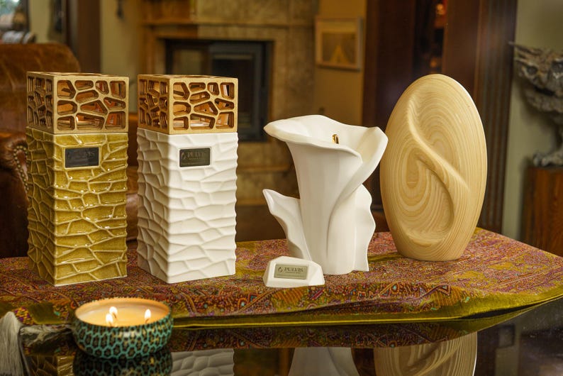 Pulvis Art Urns creates exceptional handmade cremation urns for humans and pets, carefully crafted in Europe by skilled artisans. Each urn combines modern design with timeless craftsmanship, offering a unique and meaningful way to honor a loved one. Made from premium ceramic materials, Pulvis urns are suitable for display at home or for outdoor memorials, blending beauty, durability, and symbolism. Every piece is thoughtfully designed to celebrate life, love, and remembrance.