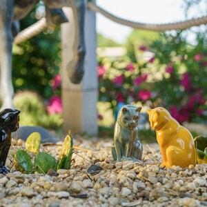 Ceramic Art Urn for Cats cremation ashes. The urn represents a cat sitting in a comfortable position with its tail around her body and its head gently looking left. Mini pet memorial urn. Pet memorial urn for ashes. Pet mini urn. Mini Urn by Pulvis