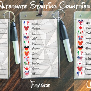 May include: Three white plastic cards with a gray background and a grid pattern. Each card has a different country's flag at the bottom: Canada, France, and UK. Each card has a list of countries with a checkbox next to each country name. The countries listed are Canada, UK, France, Morocco, Japan, USA, Italy, Germany, China, Norway, and Mexico.