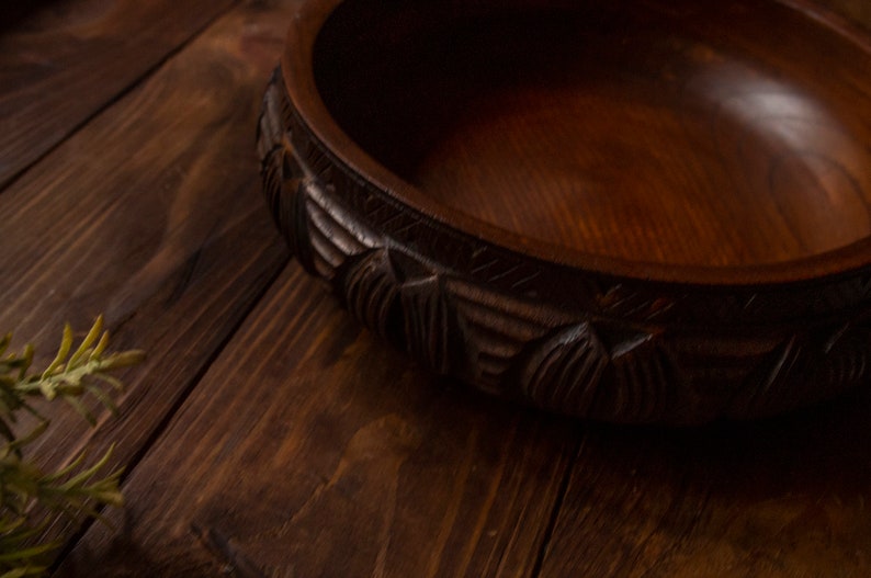 Vintage wooden fruits bowl.