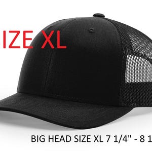 May include: Black XL baseball cap with a mesh back. The cap has a curved brim and a button on top. The text "SIZE XL" is printed in red on the front. The hat size is 7 1/4" - 8 1/8".