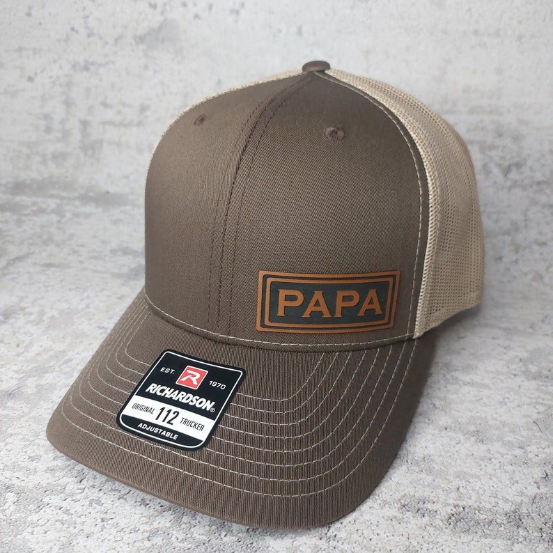 The Richardson 112 Trucker Hat is a perfect gift. This snapback trucker hat is OSFM and the perfect gift! This trucker hat should be on the top of your gift list. Baseball Cap style with a mud-profile fit.

Richardson 112 Snapback Trucker Hat