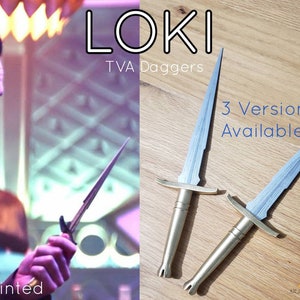 May include: Two silver and gold 3D printed daggers with a textured blade. The daggers are on a wooden surface. The text "LOKI TVA Daggers 3 Versions Available" is in the image.