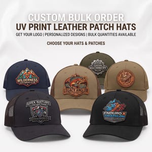 May include: A collection of six baseball caps featuring various UV printed leather patches with logos including Wilderness Explorers Club, Legacy Angler, Custom Machinery Sales, Artisan Woodworks, Apex Nature Collective, and Enduro X Triathlon.