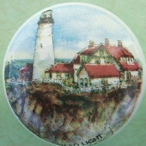 May include: A vintage illustration of a white lighthouse with a red roof on a rocky cliff. The lighthouse is surrounded by a green grassy area and a blue sky with white clouds. The text "Sea Light" is visible at the bottom of the image.